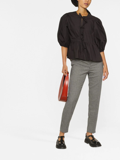 Ganni Puff-sleeved Peplum Blouse In Black