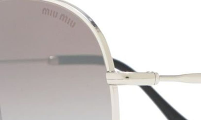 Shop Miu Miu 57mm Round Aviator Sunglasses In Silver / Grey Mirror