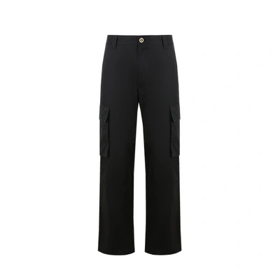 Shop Versace Pantalon À Poches In Noir