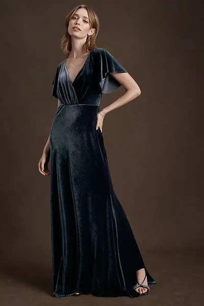 Shop Jenny Yoo Ellis Flutter-sleeve Open-back Stretch Velvet Gown In Blue