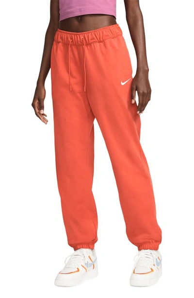 Nike Women's Sportswear Easy Jogger Pants In Mantra Orange/white | ModeSens