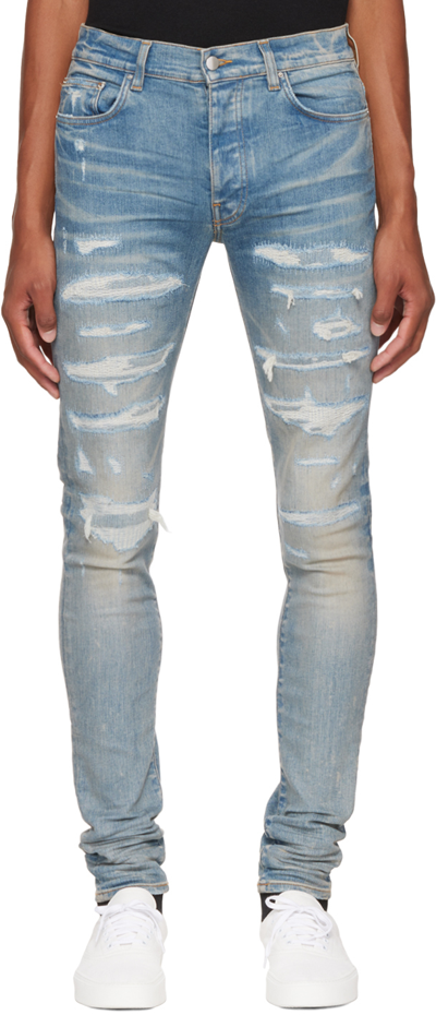 Shop Amiri Blue Repair Thrasher Jeans In Clay Indigo-12 oz It
