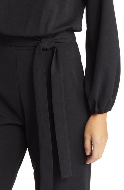 Shop Nikki Lund Joy Long Sleeve Tie Waist Jumpsuit In Black