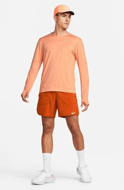 Shop Nike Element Dri-fit Long Sleeve Running T-shirt In Orange Trance/ Arctic Orange