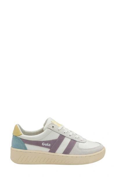Shop Gola Classics Grandslam Trident Sneaker In White/ Lily/ Lemon