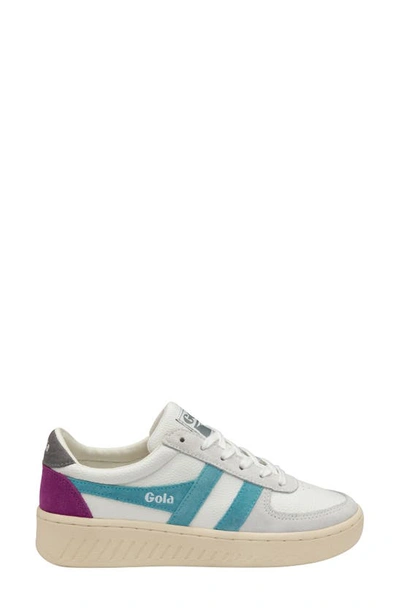 Shop Gola Classics Grandslam Trident Sneaker In White/ Ocean/ Ash