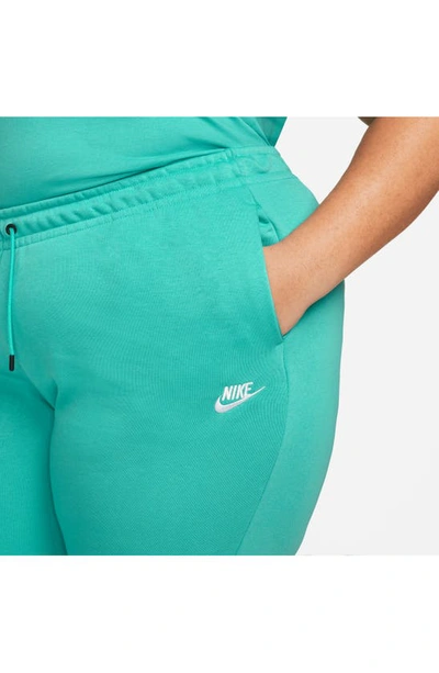 Shop Nike Sportswear Essential Fleece Pants In Washed Teal/ White