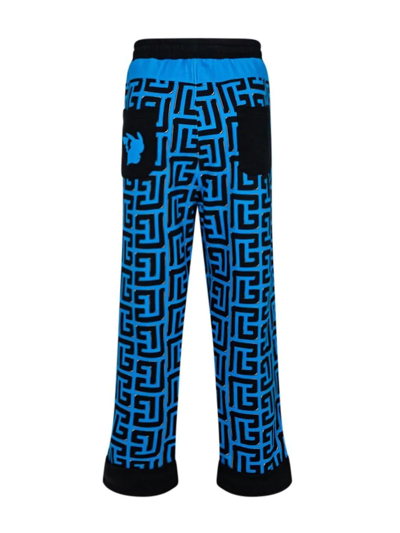 Balmain Monogram-print Cotton Track Pants In Blue