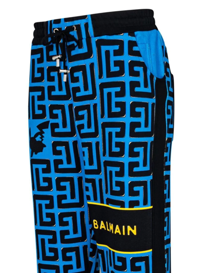 Balmain Monogram-print Cotton Track Pants In Blue