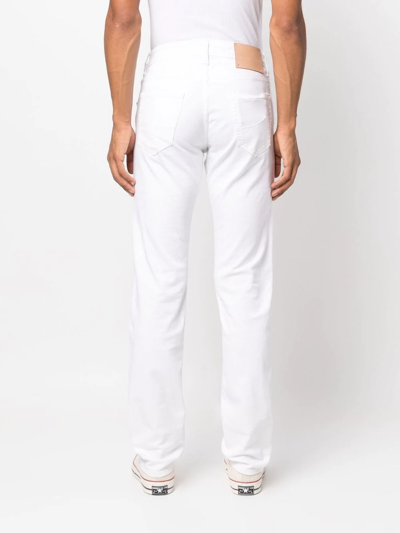 Shop Jacob Cohen Low-rise Slim-fit Jeans In Weiss