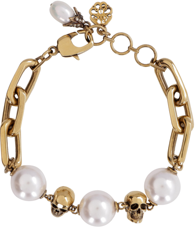 Alexander Mcqueen Pearl-embellished Skull Bracelet In Gold