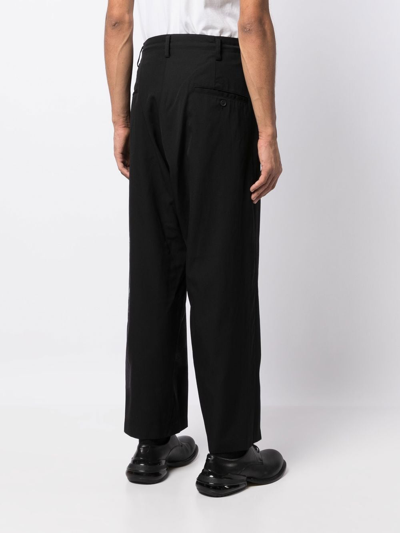 Shop Yohji Yamamoto Illustration-style Print Trousers In Schwarz