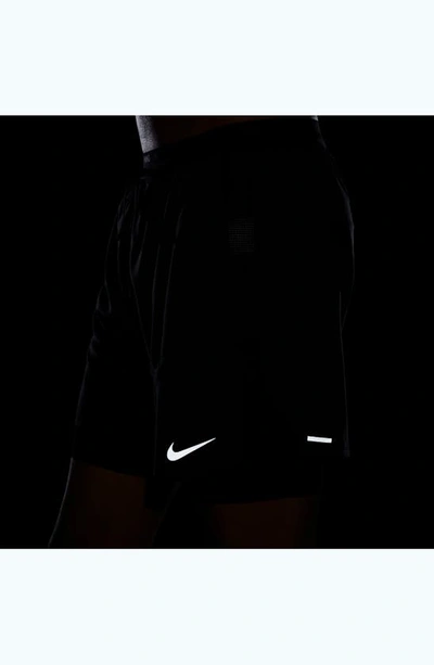 Shop Nike Dri-fit Stride Hybrid Running Shorts In Black/ Black/ Black