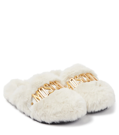 Shop Moschino Logo Faux Fur Slippers In White