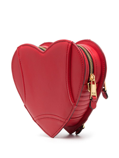 Shop Moschino Heart-shaped Biker Crossbody Bag In Rot