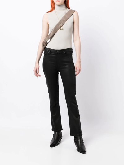 Shop Paige Claudine Coated Flared Jeans In Black
