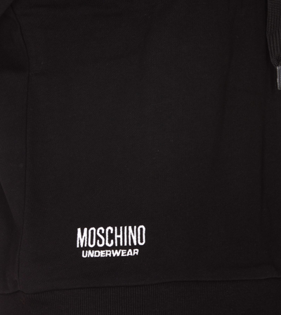 Shop Moschino Hoodie In Black