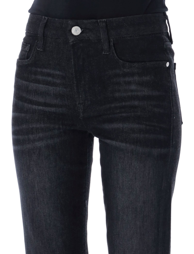 Shop Frame Le Cropped Mini Boot Jeans In Corvo Black