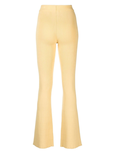 Shop Aeron Egon Rib-knit Flared Trousers In Yellow