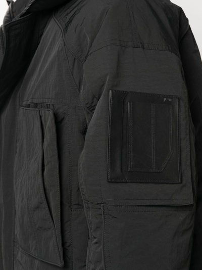 Shop Juunj Panelled-design Puffer Jacket In Schwarz