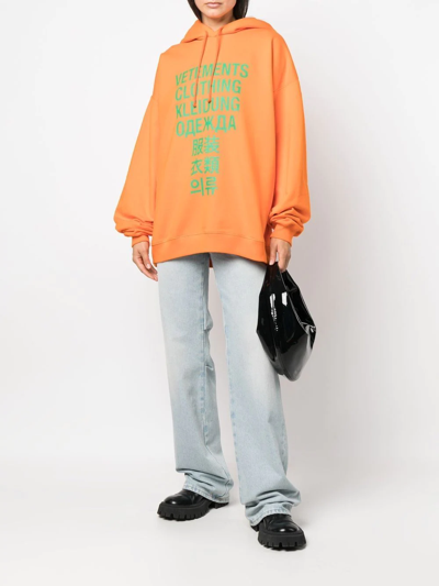 Shop Vetements Translation Logo-print Hoodie In Orange