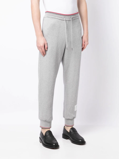 Thom Browne Herringbone-pattern Logo-patch Track Pants In Grau