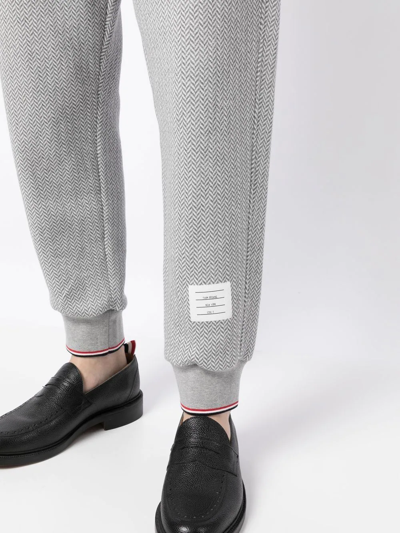 Thom Browne Herringbone-pattern Logo-patch Track Pants In Grau