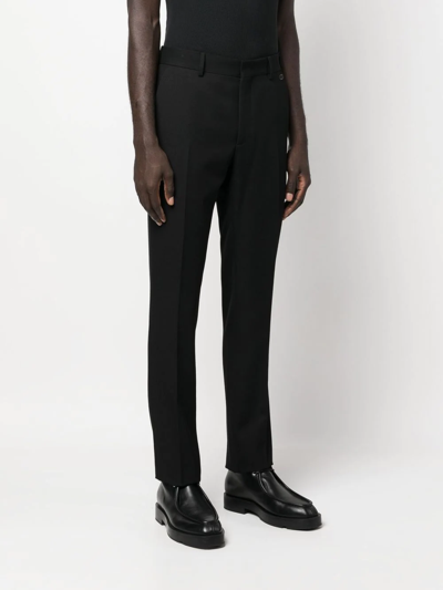 Fendi Logo-plaque Tailored Trousers In Schwarz