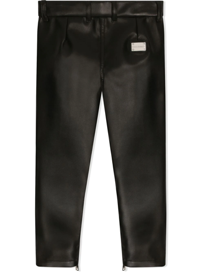 Shop Dolce & Gabbana Faux-leather Logo-plaque Trousers In Black