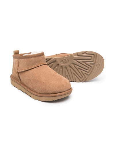 Shop Ugg Classic Ultra Mini Boots In Brown