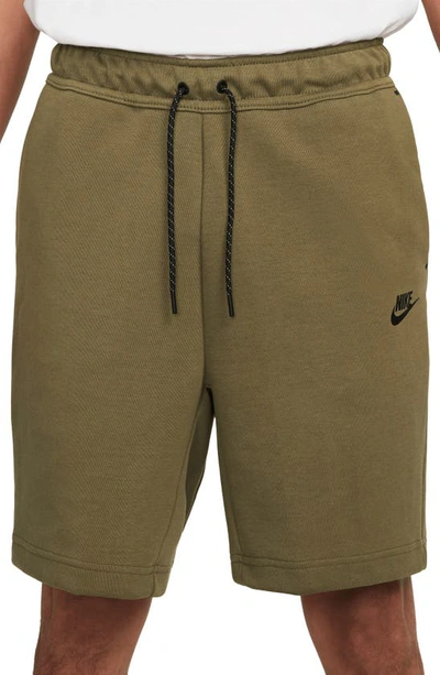 Shop Nike Sportswear Tech Fleece Shorts In Medium Olive/ Black