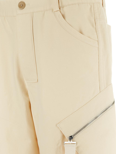 Shop Jacquemus Cargo Trousers In White
