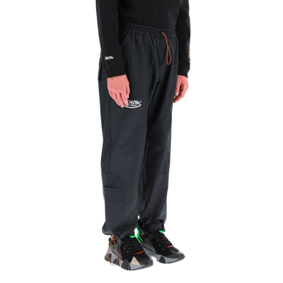 Shop Heron Preston Hot Lightweight Cady Trousers In Black