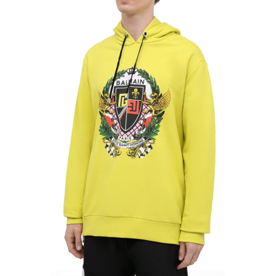 Shop Balmain Logo Hooded Sweatshirt In Yellow