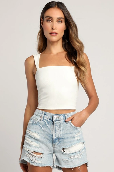 Shop Free People Maggie Mid-rise Light Wash Distressed Shorts In Blue