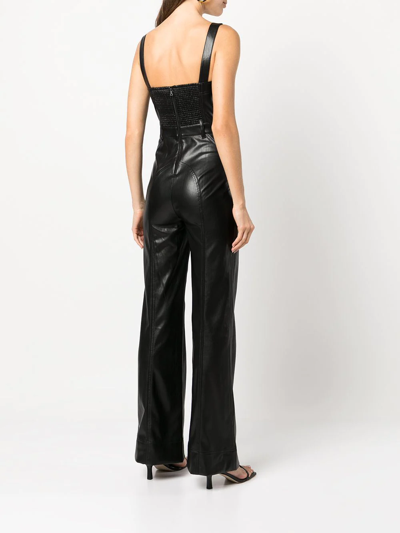 Shop Alice And Olivia Faux Leather Jumpsuit In Schwarz