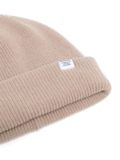 Shop Norse Projects Logo-patch Ribbed-knit Beanie In Neutrals