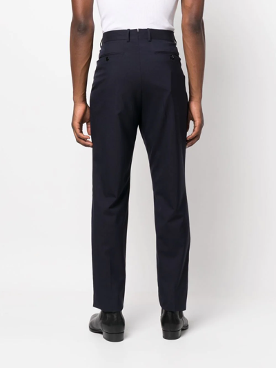 Shop Tom Ford Pleated Tapered-leg Trousers In Blau