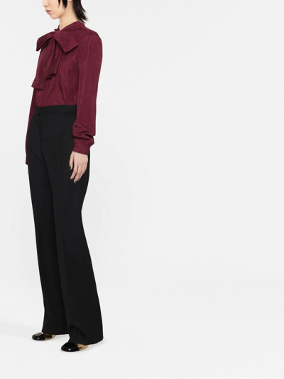 Moschino Flared Leg Crepe Pants With Hook In Animal Print