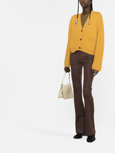 Frame Flared Low-rise Jeans In Brown