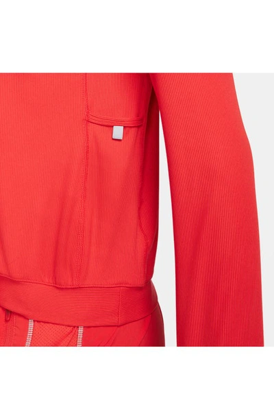 Shop Nike Element Half Zip Pullover In Light Crimson/ Magic Ember
