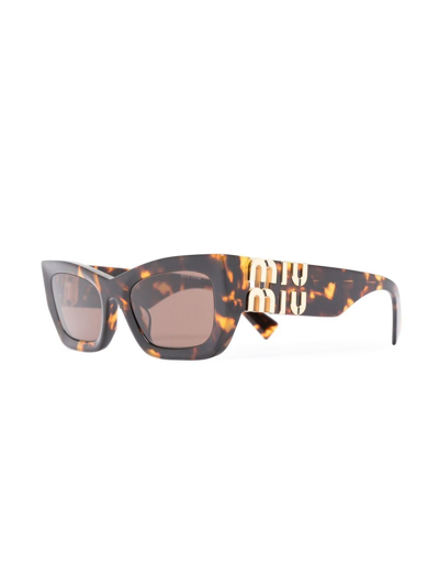 Shop Miu Miu Cat-eye Frame Sunglasses In Braun