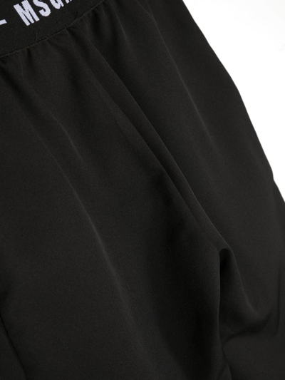 Shop Msgm Logo-print Straight Trousers In Black