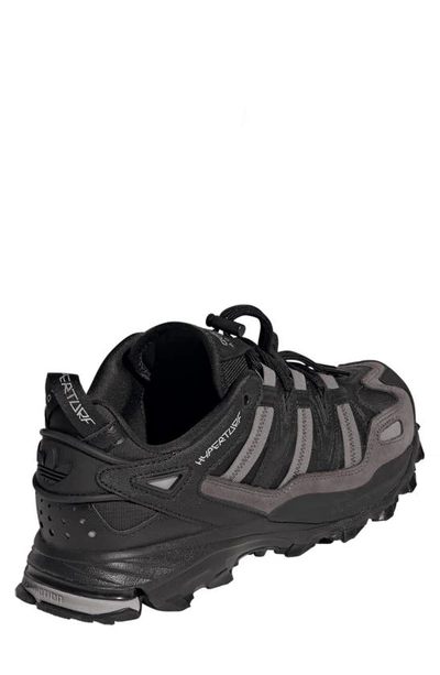 Shop Adidas Originals Hyperturf Adventure Running Shoe In Core Black/ Silver Met./ Grey