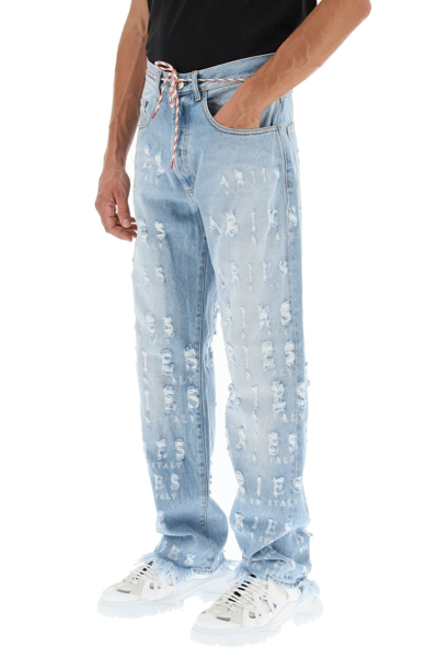 Shop Aries Distressed Lettering Motif Jeans In Multicolor