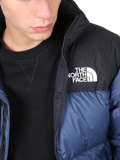 Shop The North Face "1996" Nylon Down Jacket In Blue