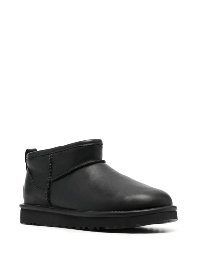 Shop Ugg Classic Ultra Mini Leather Ankle Boots In Black