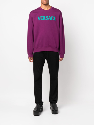 Shop Versace Embroidered Logo Cotton Sweatshirt In Purple