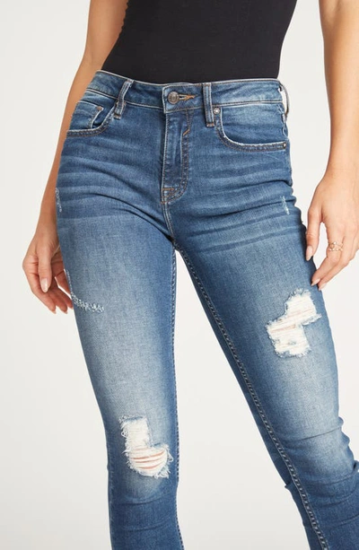 Vigoss Jagger Distressed Raw Hem Skinny Jeans In Med Wash