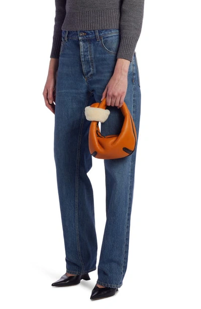 Shop Bottega Veneta Mini Aviator Jodie Leather Hobo Bag With Shearling Trim In Honey/ Fondant-m Br